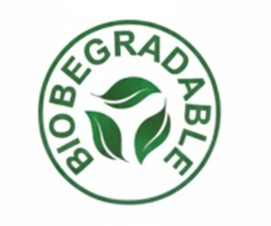 Biodegradable logo with green leaves inside a circle.